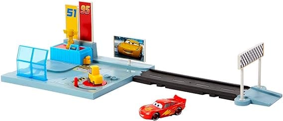 Disney and Pixar Cars On The Road Dinoco Rusteze Racing Center Playset with Lightning McQueen Toy Car, Launcher, Short Track and Spinning Pitty, Toy Gift for Kids, HGV69 Multicolor